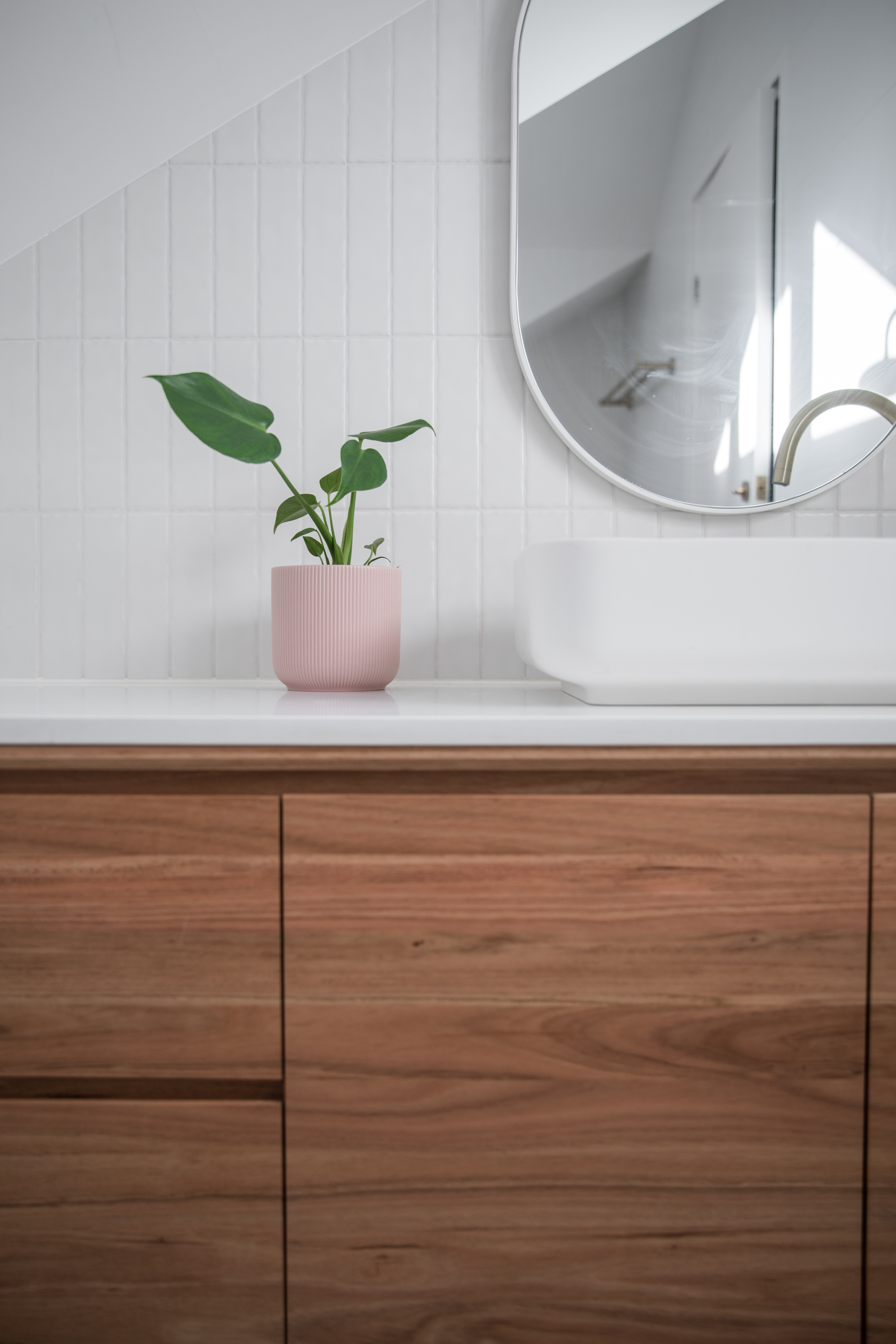 A stylish bathroom tile backsplash - for tile installation companies in Raleigh, NC contact Footprints Bath and Tile.