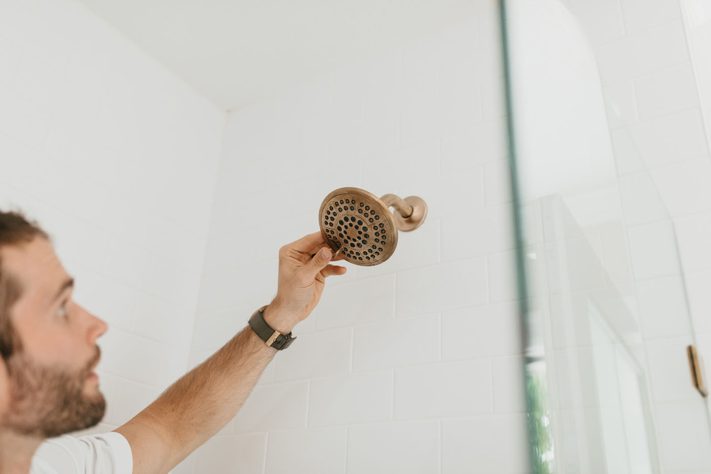 A Footprints technician going over project planning for a spa bathroom remodel.
