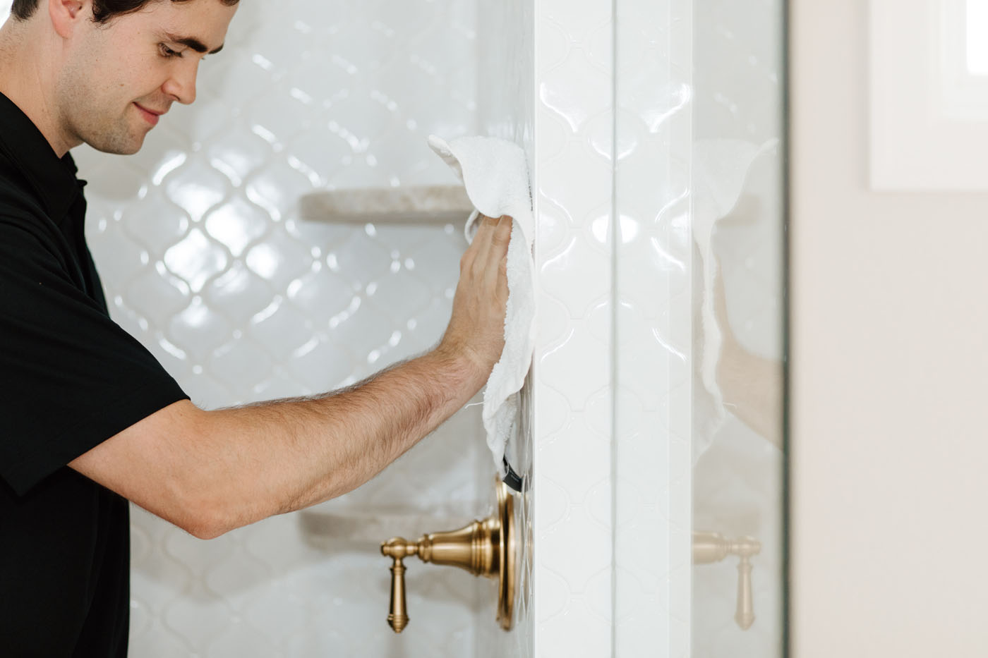 A Footprints professional working on a shower project - trust our expert shower tile installers in Columbus, OH to take care of your home and bring your vision to life.