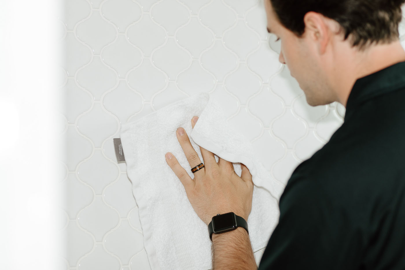 A Footprints expert providing tiling services for a residential home - discover what Footprints licensed bathroom contractors in Columbus, OH can do for you.