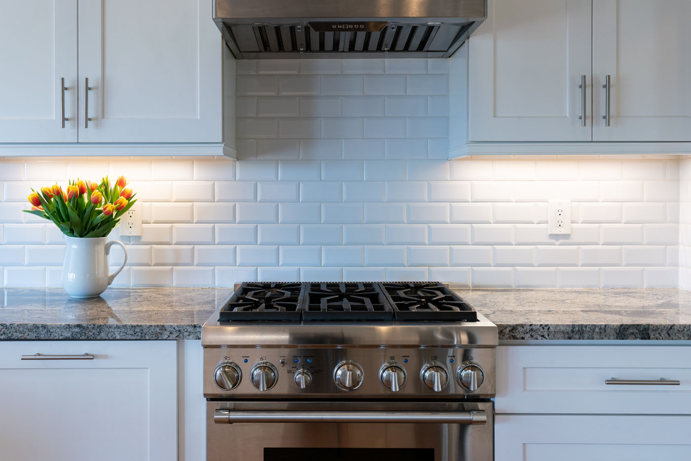 The results of a Footprints Bath and Tile tile backsplash renovation.