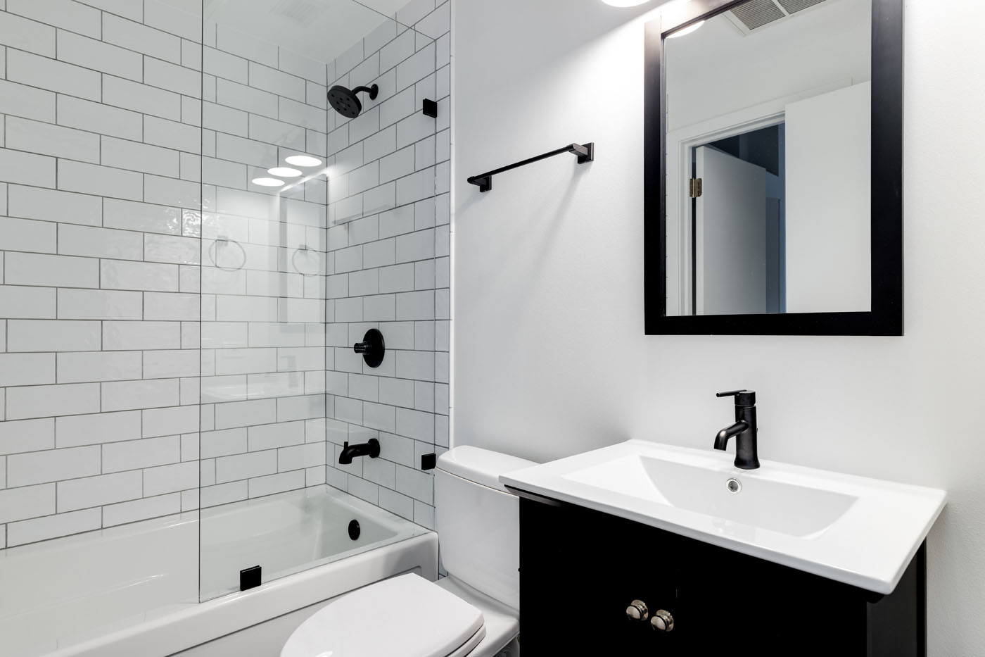 A beautiful and bright guest bathroom renovation completed by Footprints Bath and Tile.
