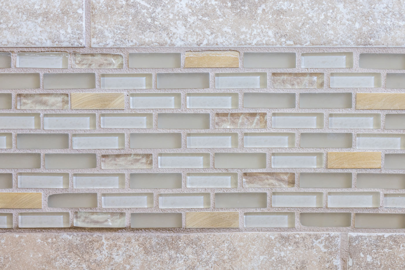 Glass tile installed by Footprints Bath and Tile's glass tile installers.