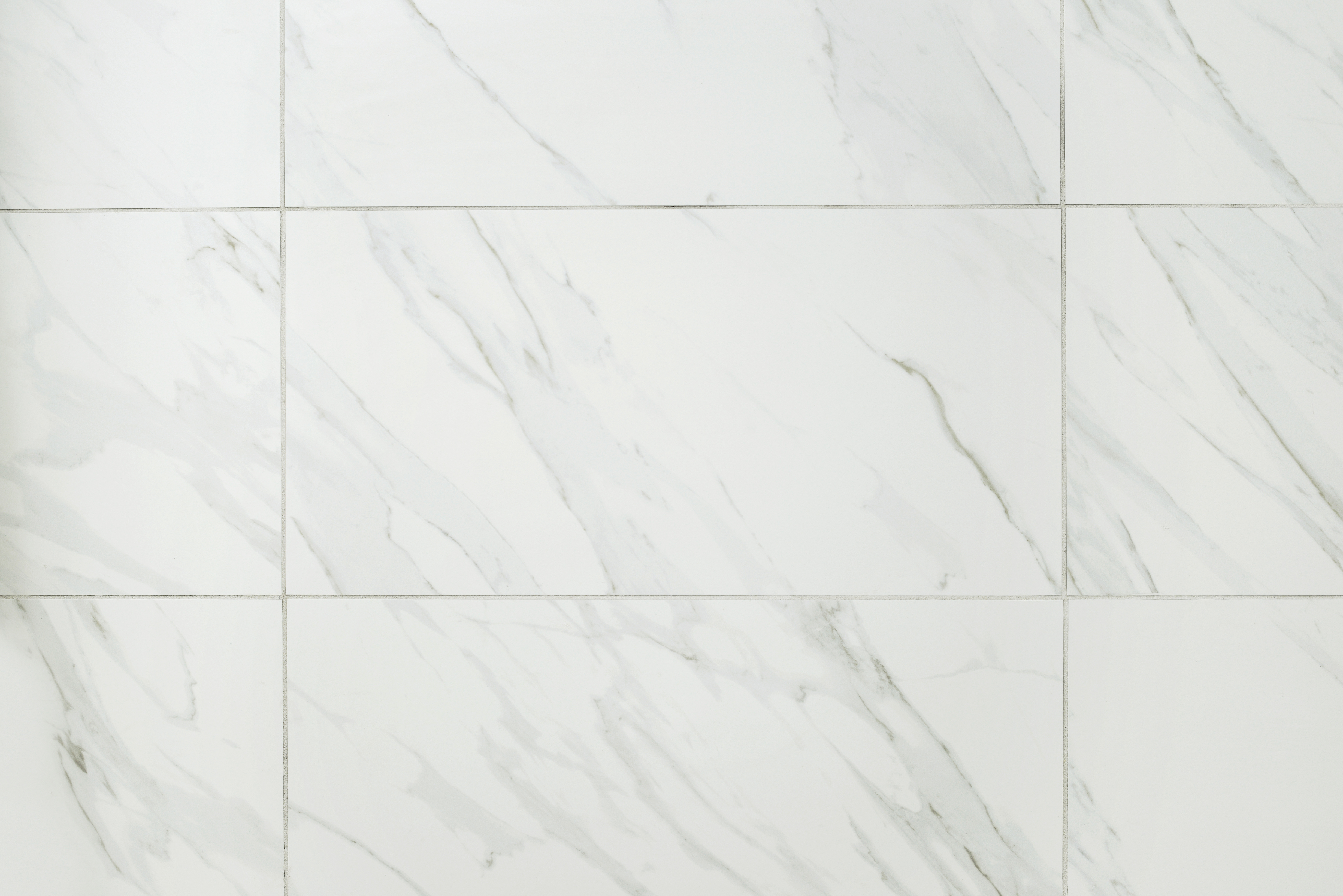 An oversized style installation in Kansas City from Footprints Bath and Tile.