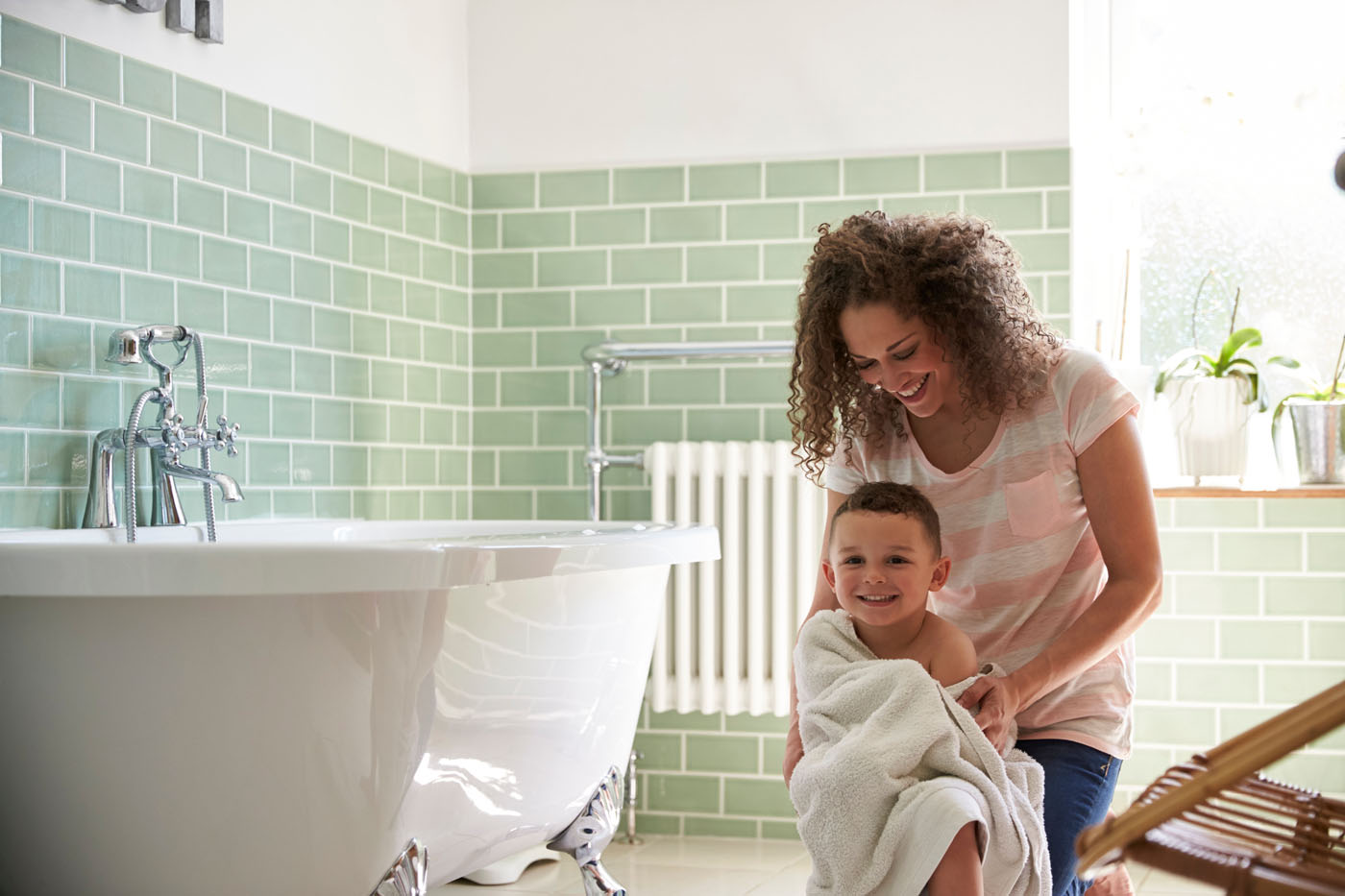 A family enjoying their bathroom space - get a bathroom remodel in Boylan Heights, NC with Footprints today.