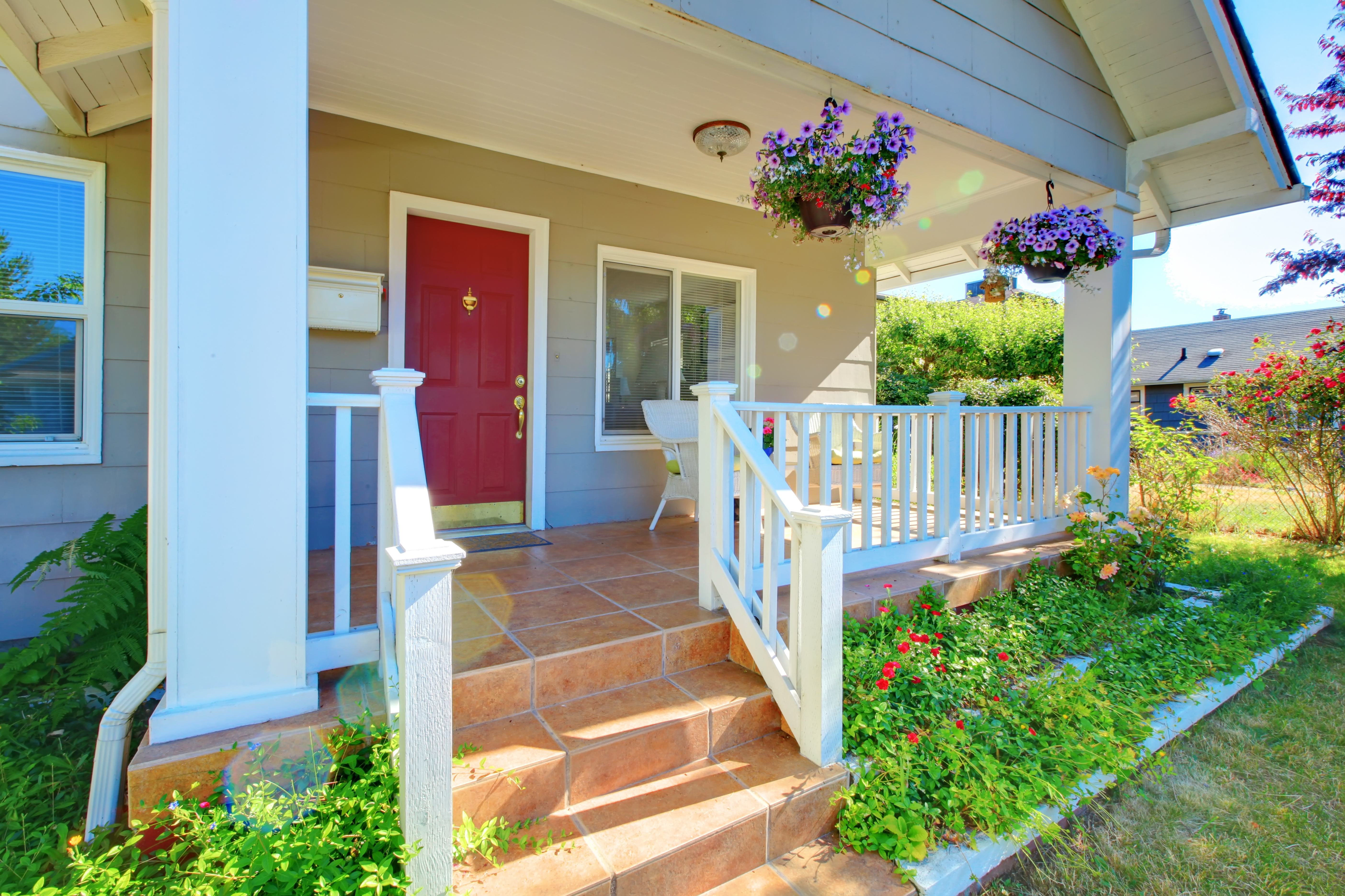 The front of a home with a tiled patio from Footprints Bath and Tile Broomfield / Boulder.