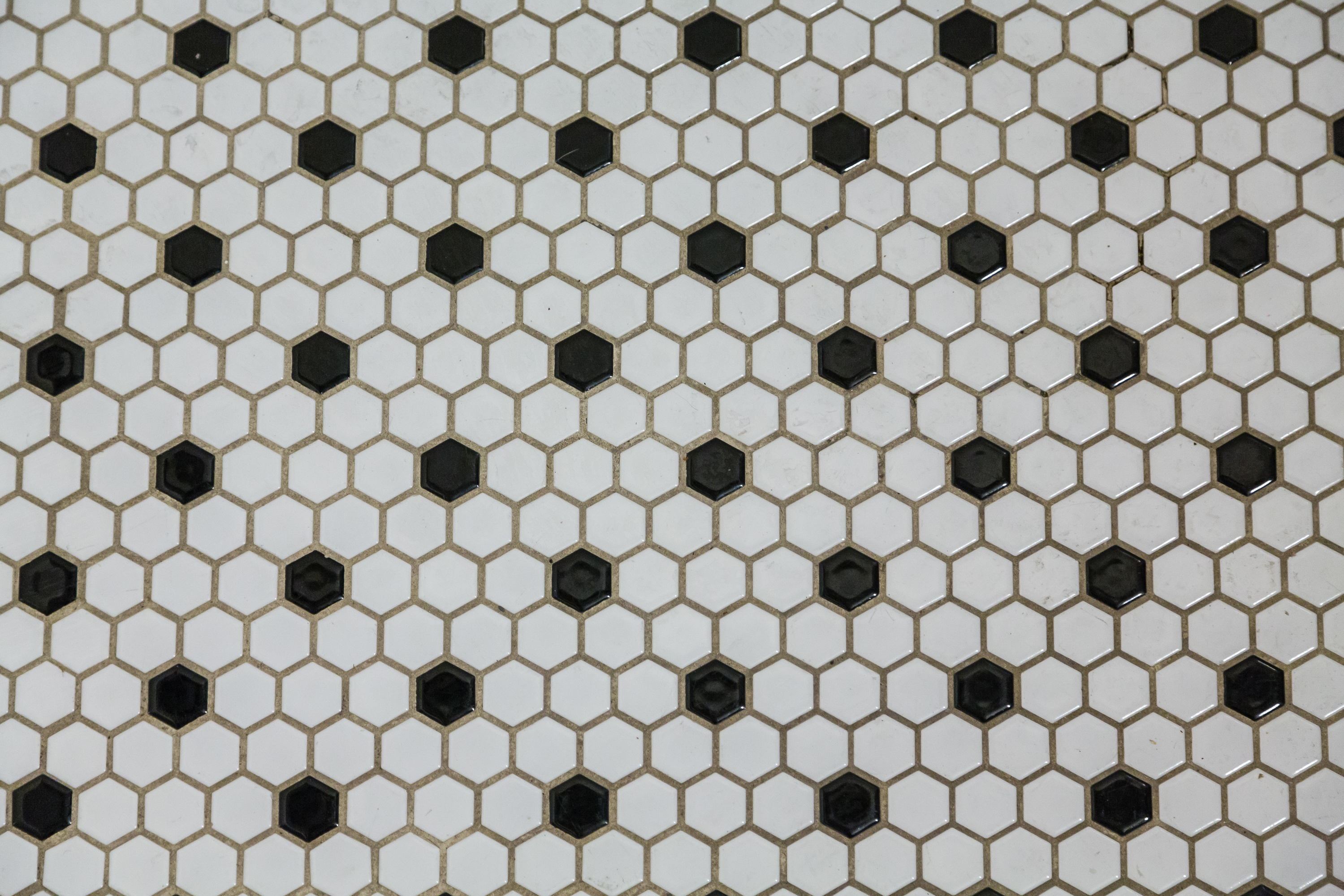 A penny tile installation in Kansas City from Footprints Bath and Tile.