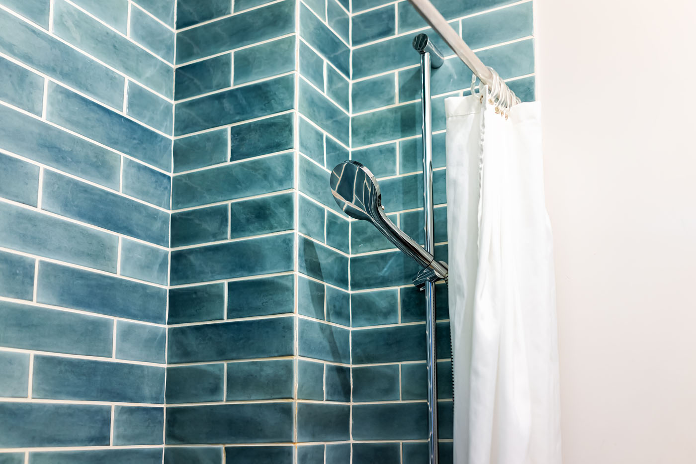 A dream shower tile design come to life with Footprints Bath and Tile.