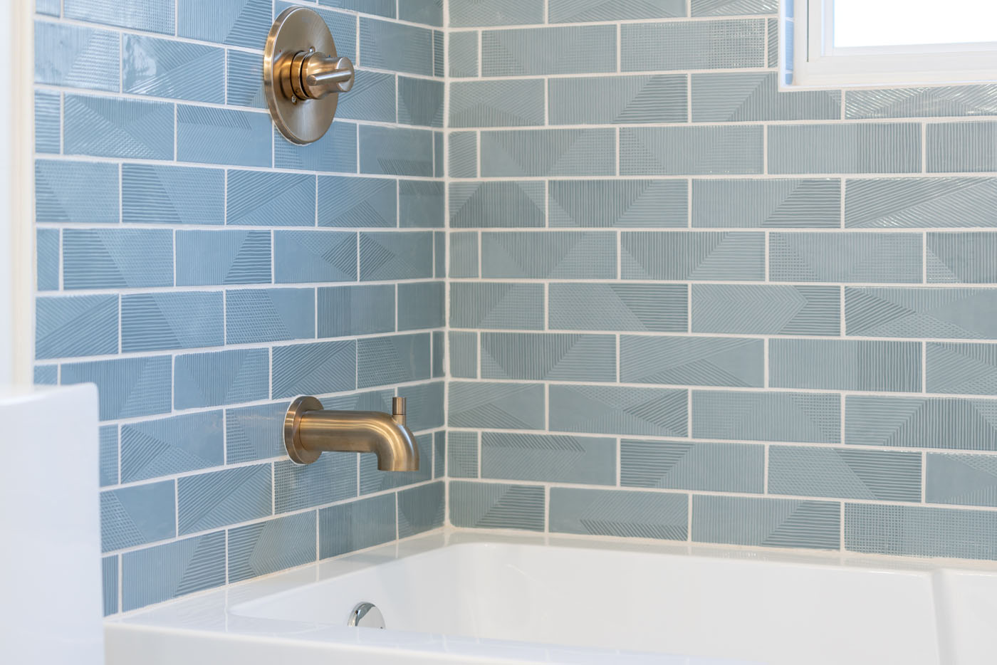 A beautifully renovated shower - done by the professional Columbus bathroom shower contractors at Footprints Bath and Tile.